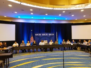 Committee members seated at table